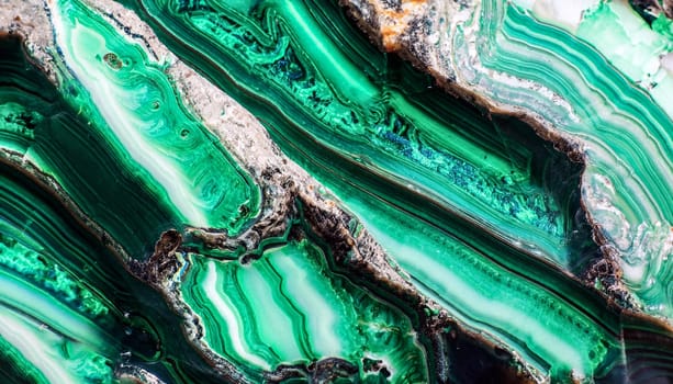 Unusual patterns of the polished malachite gemstone. Abstract green concentric structures