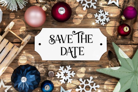 Colorful Christmas Decor With Bokeh, Christmas Balls And Snowflakes, With Sign With Text Save The Date