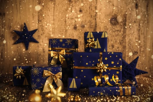 Copy Space, Wooden Background, Blue Christmas Presents, Snowfall, Gifts And Winter Decoration