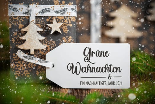 German Text Gruene Weihnachten Und Ein Nachhaltiges Jahr 2024, Means Green Christmas And A Sustainable Year 2024 In English, On A Label, Christmas Gifts, Eco Friendly Winter Decor With Snowfall