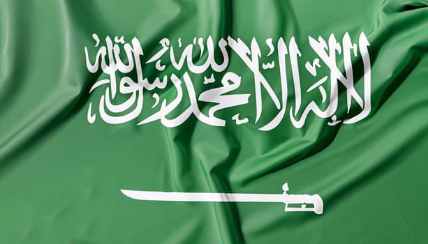 Saudi Arabia flag on a silk drape waving. folded flag of Saudi Arabia with visible satin texture