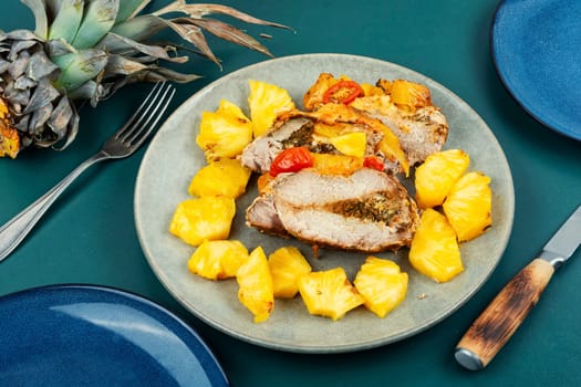 Appetizing meat roasted with fresh pineapple. Flat lay with copy space