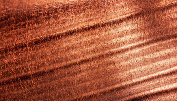 Texture of shiny old copper bar, abstract background