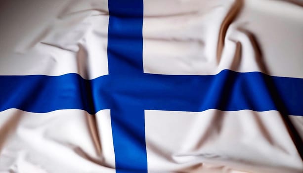 Fabric texture flag of Finland. Flag of Finland waving in the wind. Finland flag is depicted on a sports cloth fabric with many folds. Sport team banner