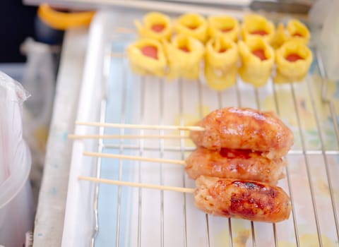 Grilled Sausage Skewers , Thai street food .