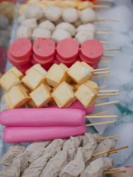 Meat and fish ball ,sausage wood stick at Street market , Thai Street food in Thailand.