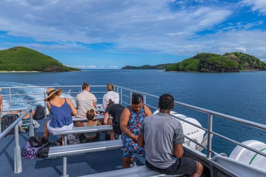 Viti Levu, Fiji: 29 May 2023: Group of tourists on a ship in the coast at Denarau port. Viti Levu. Fiji