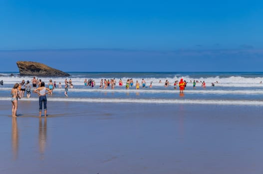 Biarritz, France, July 03, 2023: People at the beach Grande Plage (Big beach) in the French resort town of Biarritz.