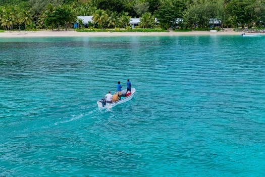Nacula Fiji: June 25 2023: Group of tourists on a ship in the coast of Nadi, Fiji Islands