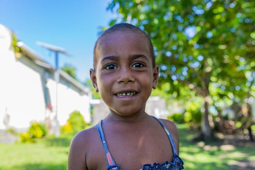Viti Levu, Fiji: 26 May 2023: happy young girl in a rural area of Viti Levu, South Pacific Islands, Pacific