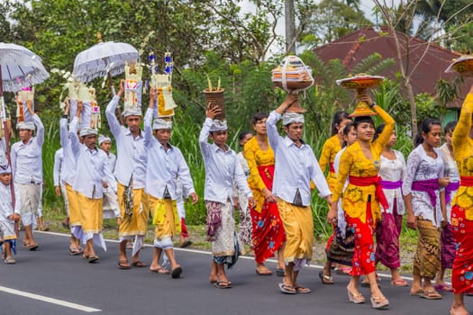 Bali, Indonesia: 17 August 2020: Royal cremation ceremony. Balinese hindus religion procession. Bade and Lembu Black Bull symbol of transportation for the spirit to the heaven