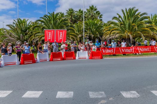 Bayonne, France: 03 July 2023: People in the streets waiting for the Caravan of Tour de France in the 3 stage of "Le Tour de France"" in Bayonne, Basque Country. France."