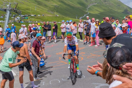 Col du Tourmalet, France - July 06 2023: Pierre Latour climbig the road to Col du Tourmalet in Pyerenees mountains during the stage 6 of Le Tour de France 2023.