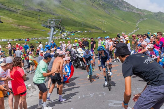 Col du Tourmalet, France - July 06 2023: Romain Bardet climbig the road to Col du Tourmalet in Pyerenees mountains during the stage 6 of Le Tour de France 2023.
