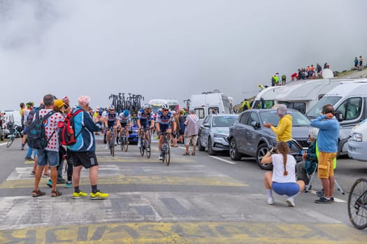 Col du Tourmalet, France - July 06 2023: Soudal Quick-Step Team climbig the road to Col du Tourmalet in Pyerenees mountains during the stage 6 of Le Tour de France 2023.