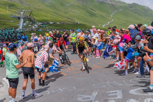Col du Tourmalet, France - July 06 2023: Sepp Kuss climbig the road to Col du Tourmalet in Pyerenees mountains during the stage 6 of Le Tour de France 2023.