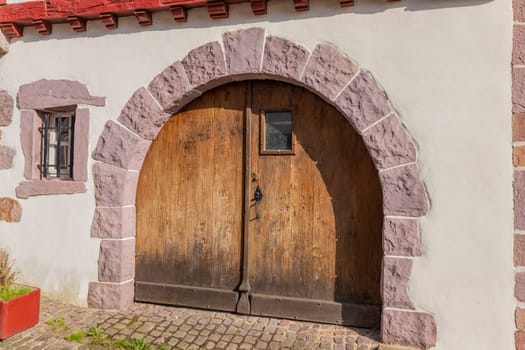 Saint Jean Pied de Port, France, July 03, 2023: Old door in Saint Jean Pied de Port, France in Saint Jean Pied de Port Basque Country, France