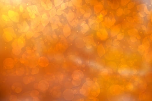 Hello autumn background. Abstract autumn gradient gold yellow orange bright background texture with leaves and bokeh circles. Indian summer. Card design with space text. Beautiful backdrop.