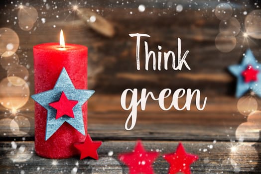 Text Think Green, On A Wooden Background, With Red Candle, Festive Winter Decor, Christmas, Snow