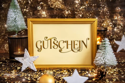 Golden Frame With German Text Gutschein, Means Voucher In English, Golden And Glittering Christmas Decoration, Winter Background