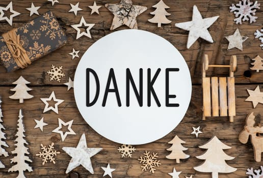 German Text Danke, Means Thanks In English, On Wooden Background, Natural Christmas Decor, Winter Eco Friendly Flatlay
