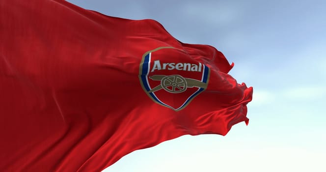 London, UK, oct. 15 2023: Close-up of Arsenal football club waving on a clear day. English professional football club. Premier League. Illustrative editorial 3d illustration. Rippling fabric