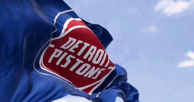 Detroit, US, Sept 10 2023: Detroit Pistons flag waving on a clear day. American professional basketball team, Central Division of the Eastern Conference. Illustrative editorial 3d illustration render