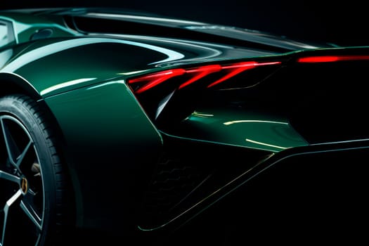 Rear stop LED light of green car. Luxury car tail light on a dark  background. AI generated
