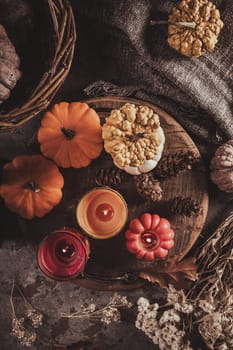 Home decoration with pumpkins and candles for Thanksgiving and Halloween