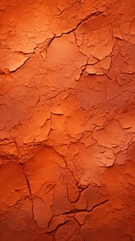 the dry arid earthy cracked background is an iron rich dry clay that is orange in color.Generative AI