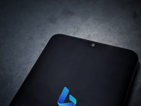 Lod, Israel - July 16,2023: Bing Browser app launch screen on smartphone on dark marble stone background. Top view flat lay with copy space.