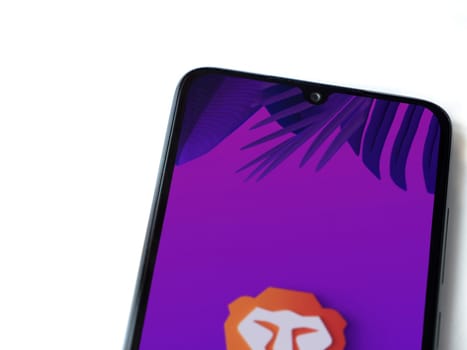 Lod, Israel - July 16,2023: Brave Private Browser app launch screen on smartphone on white background. Top view flat lay with copy space.