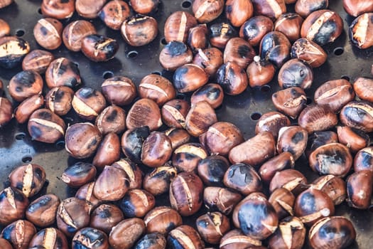 Grilled chestnuts being selled at stalls in autumn.