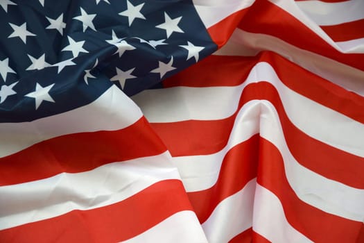 United States of America waving flag with many folds. Patriotic background for american holidays design