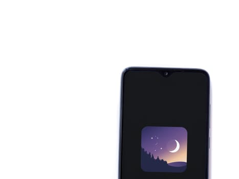 Lod, Israel - July 16,2023: Stellarium - Star Map app launch screen on smartphone on white background. Top view flat lay with copy space.