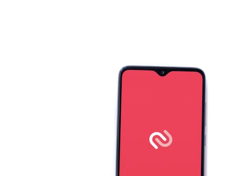 Lod, Israel - July 16,2023: Twilio Authy Authenticator app launch screen on smartphone on white background. Top view flat lay with copy space.