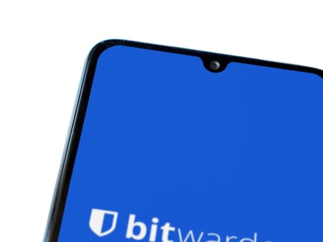 Lod, Israel - July 16,2023: Bitwarden Password Manager app launch screen on smartphone on white background. Top view flat lay with copy space.