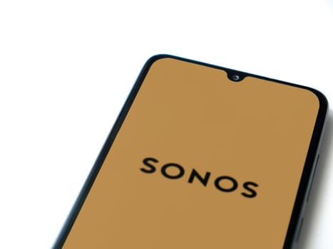 Lod, Israel - July 16,2023: Sonos app launch screen on smartphone on white background. Top view flat lay with copy space.