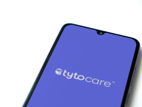 Lod, Israel - July 16,2023: TytoCare app launch screen on smartphone on white background. Top view flat lay with copy space.