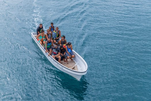 Nadi, Fiji - 24 May, 2023: Group of people on a boat in the coast of Nadi, Fiji Islands