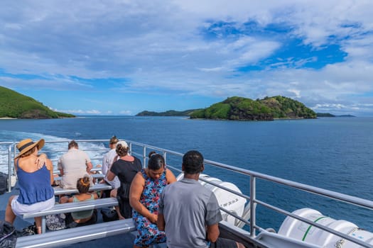 Viti Levu, Fiji: 29 May 2023: Group of tourists on a ship in the coast at Denarau port. Viti Levu. Fiji