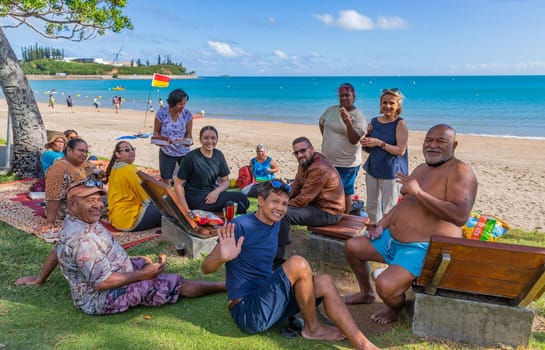 Noumea New Caledonia - 03 June, 2023: Melanesian people relaxing at the beach in Noumea, New Caledonia.