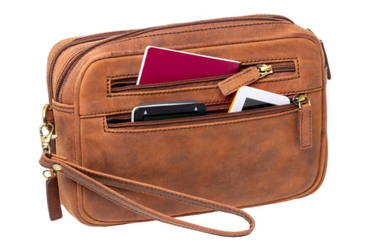 Leather handbag isolated. Close-up of brown businessman luxury leather wrist handbag. Clipping Path. Fashionable brown leather briefcase or bag for men.