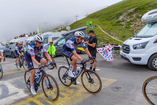 Col du Tourmalet, France - July 06 2023: Soudal Quick-Step Team climbig the road to Col du Tourmalet in Pyerenees mountains during the stage 6 of Le Tour de France 2023.