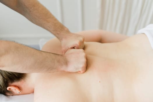 Anti-cellulite foot massage for fat woman. Concept of personal care, weight loss, diet. Close-up.