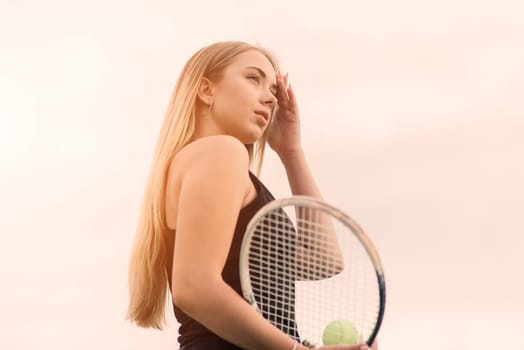 Tennis tournament. Female player at clay tennis court