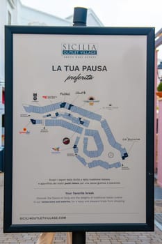 Sicily, Agira, Italy - 30 Sep 2023. Sicilia Outlet Village shopping centre is a popular visitor magnet. Overview about restaurants and eateries for break from shopping.