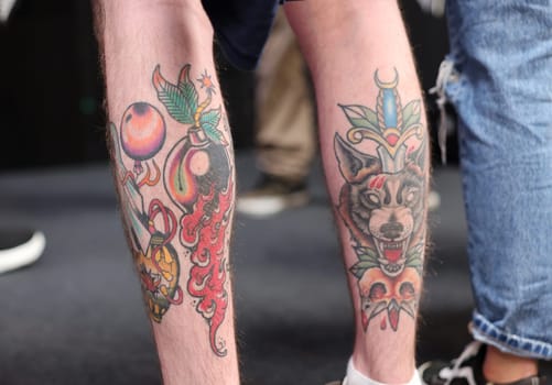 Krakow, Poland - June 11, 2022: Unidentified participant during the contest for the best tattoo at the 15th Tattoofest Convention in Cracow. One of the most prestigious tattoo festivals.