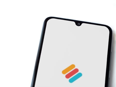 Lod, Israel - July 16,2023: Memorigi app launch screen on smartphone on white background. Top view flat lay with copy space.