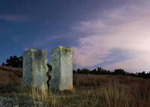 Sandstone sculptures at St. Margarethen Burgenland at night with moonlight